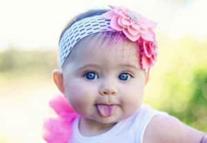 Baby sticking out tongue